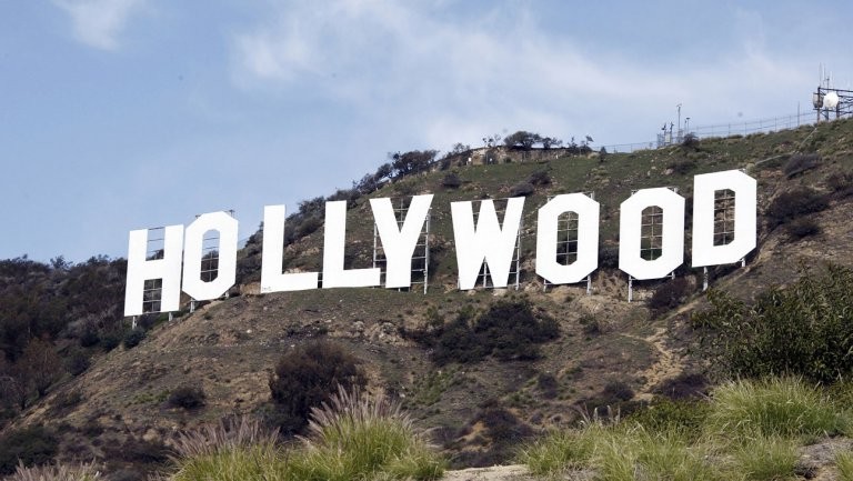 Hollywood studios looking to make films available in homes two weeks after cinema release